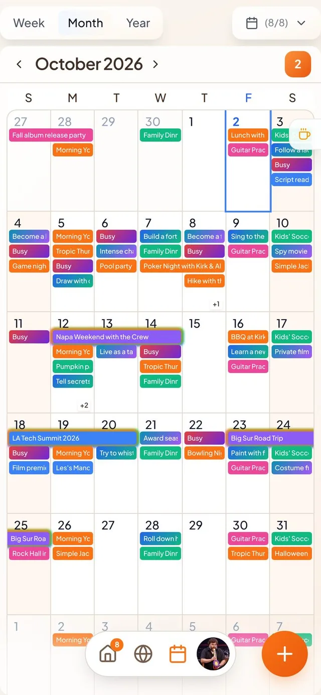 Conmigo Calendar in Month view with the rounded bottom bar and the orange Create button beside it