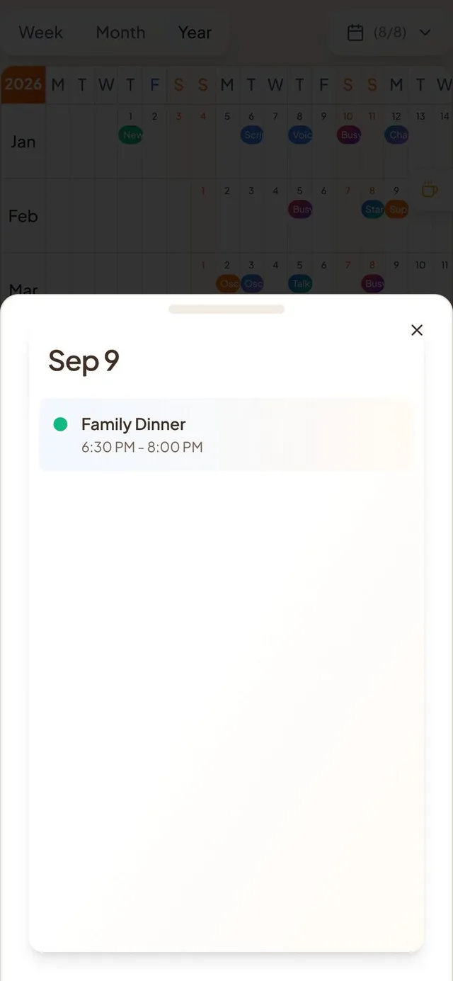 Conmigo Today drawer on the Year view, opened on September 9 with a grabber bar at the top and one event listed
