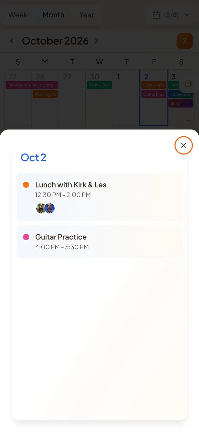 Conmigo Calendar in Month view with the Today drawer listing the day's two events